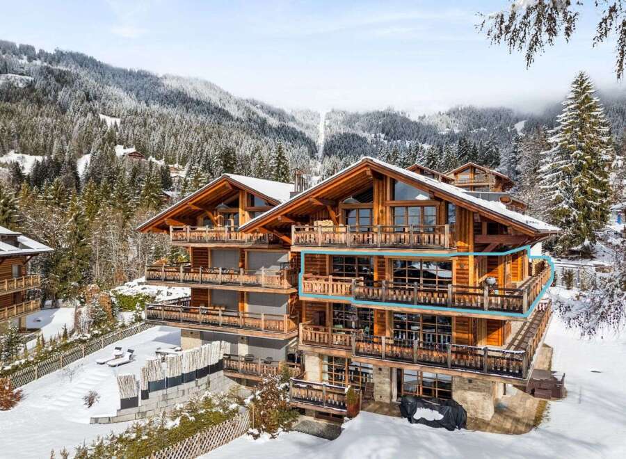 Experience luxury mountain living in this stunning chalet, nestled amidst snow-covered peaks and evergreen forests.