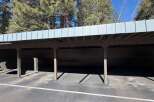 Discover convenient covered parking with this spacious carport, perfect for protecting your vehicles from the elements.