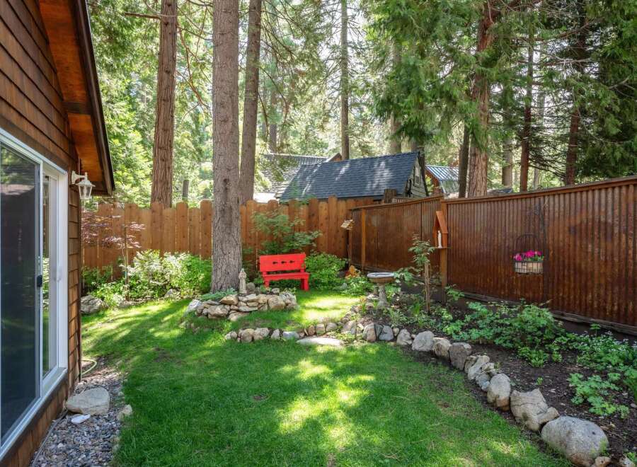 Escape to this charming backyard oasis, perfect for relaxation and outdoor enjoyment.