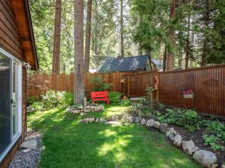 Escape to this charming backyard oasis, perfect for relaxation and outdoor enjoyment.