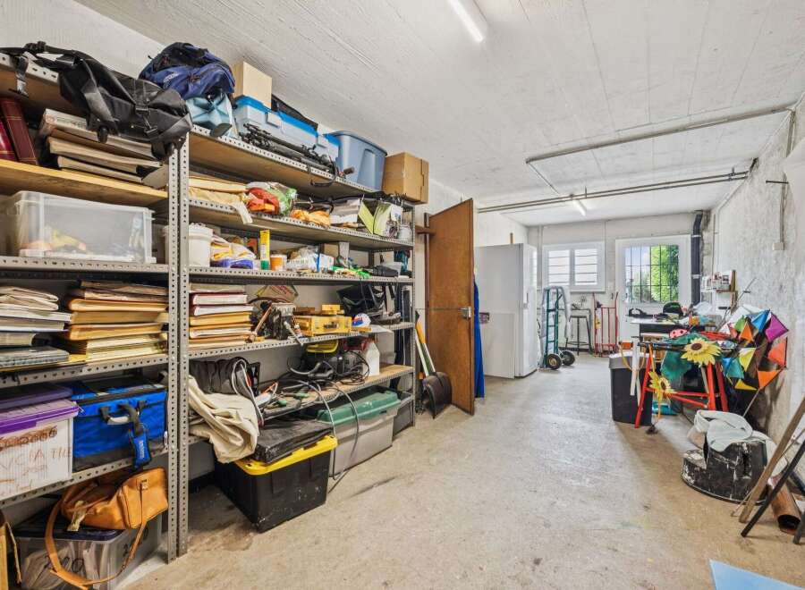 Discover ample storage solutions in this versatile garage space, perfect for organizing tools, seasonal items, and more.