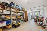 Discover ample storage solutions in this versatile garage space, perfect for organizing tools, seasonal items, and more.