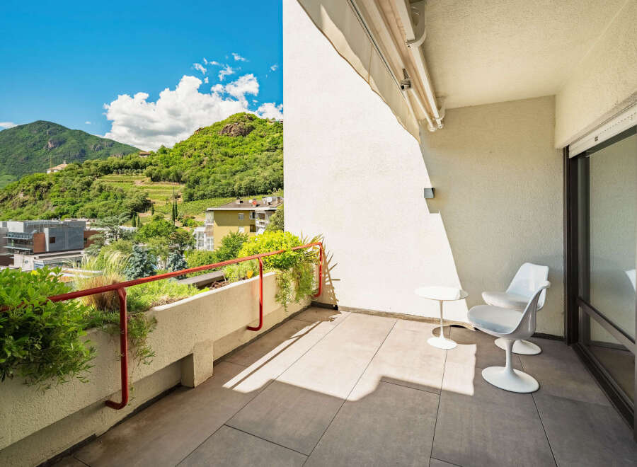 Enjoy breathtaking mountain views from this stunning balcony, perfect for your morning coffee or evening relaxation.