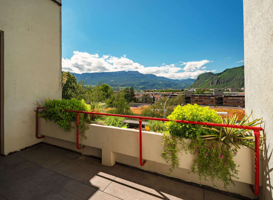 Enjoy breathtaking mountain views from this stunning balcony, perfect for outdoor relaxation and entertaining.