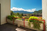 Enjoy breathtaking mountain views from this stunning balcony, perfect for outdoor relaxation and entertaining.