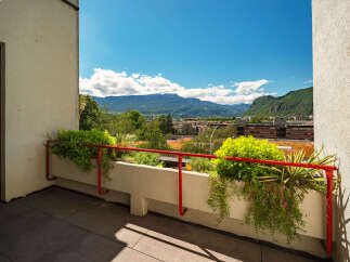 Enjoy breathtaking mountain views from this stunning balcony, perfect for outdoor relaxation and entertaining.
