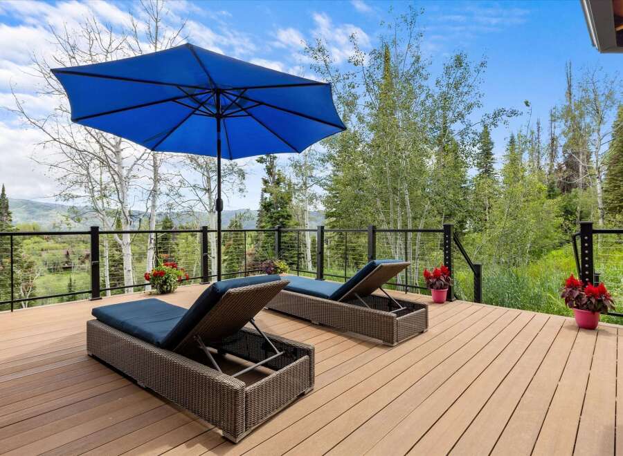 Enjoy breathtaking mountain views from this expansive deck, perfect for outdoor entertaining or relaxation.
