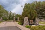 Discover the exclusive Stonepine community, offering a prestigious entrance with elegant stone pillars and a secure gated access.