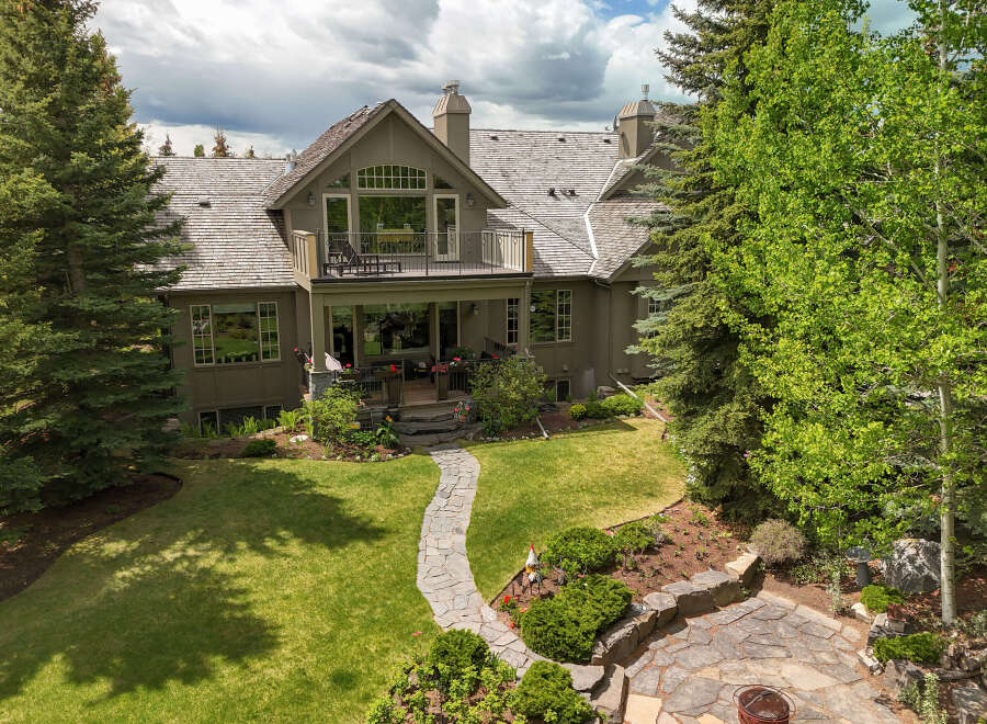 Experience luxury living in this stunning home, featuring a spacious balcony with breathtaking views and a beautifully landscaped backyard perfect for entertaining.