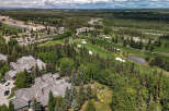 Experience luxury living in this stunning aerial view of a golf course community.
