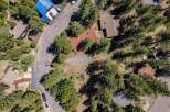 Discover this charming property nestled amongst mature pine trees, offering a serene and private mountain retreat.