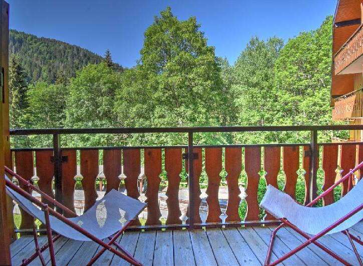 Enjoy the serene mountain views from this charming balcony, perfect for your morning coffee or evening relaxation.