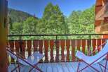 Enjoy the serene mountain views from this charming balcony, perfect for your morning coffee or evening relaxation.