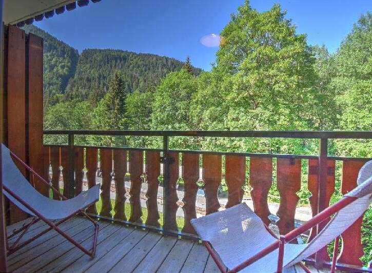 Enjoy the breathtaking mountain views from this charming balcony, perfect for your morning coffee or evening relaxation.