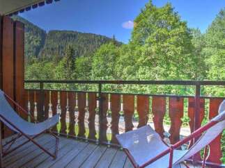 Enjoy the breathtaking mountain views from this charming balcony, perfect for your morning coffee or evening relaxation.