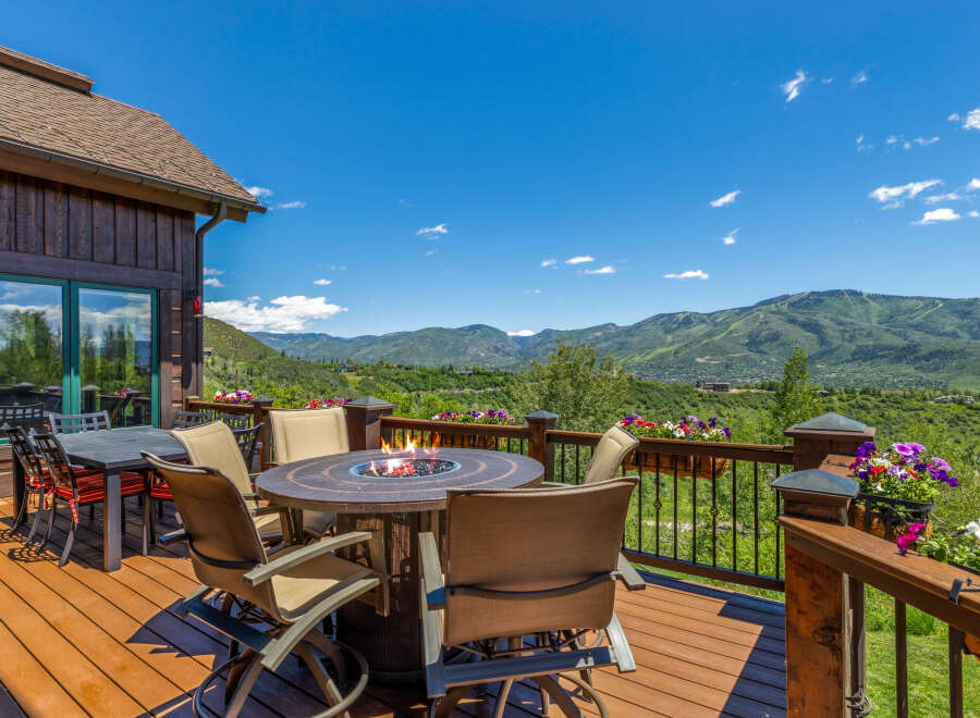 Enjoy breathtaking mountain views from this stunning deck, perfect for entertaining or relaxing.