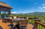 Enjoy breathtaking mountain views from this stunning deck, perfect for entertaining or relaxing.