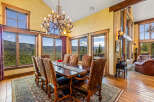Experience breathtaking mountain views from this elegant dining room, perfect for hosting memorable gatherings.