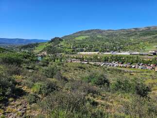 Discover this charming property nestled in a picturesque mountain town, offering a serene escape with stunning natural beauty.