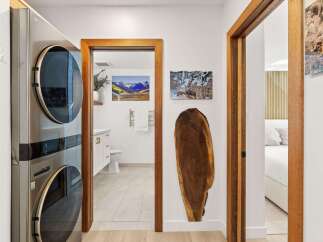 Discover modern living with this stacked LG washer and dryer set, perfect for maximizing space.