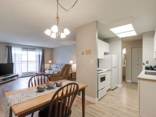 Discover this charming open-concept living space, perfect for modern living.