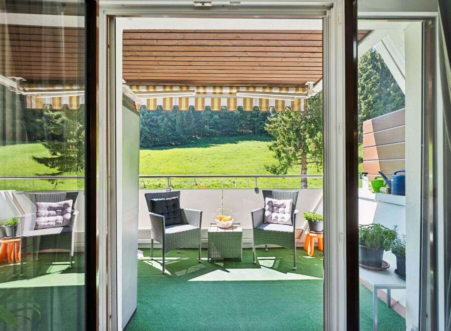 Enjoy the serene mountain views from this charming balcony, perfect for your morning coffee or evening relaxation.