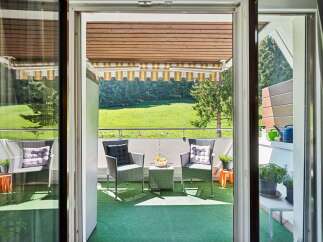 Enjoy the serene mountain views from this charming balcony, perfect for your morning coffee or evening relaxation.