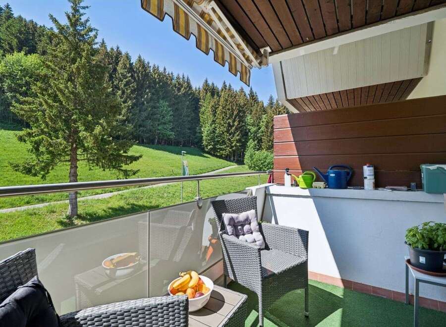 Enjoy breathtaking mountain views from this charming balcony, perfect for your morning coffee or evening relaxation.