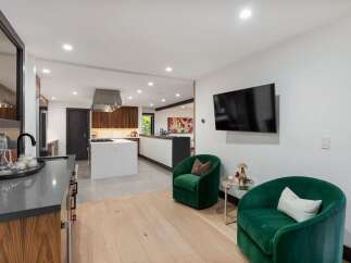 Experience modern living in this stunning open-concept kitchen and living area.