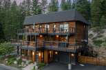 Experience luxury mountain living in this stunning multi-level home, featuring expansive decks with breathtaking forest views.