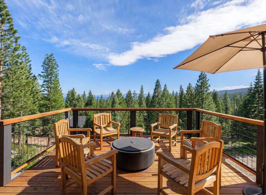 Enjoy breathtaking panoramic views from this stunning deck, perfect for entertaining or relaxing.