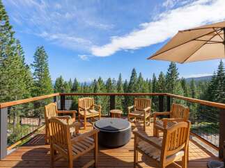 Enjoy breathtaking panoramic views from this stunning deck, perfect for entertaining or relaxing.