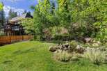 Experience luxury living in this stunning multi-level home, featuring expansive decks perfect for enjoying the surrounding natural beauty.