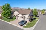 Discover this stunning home featuring a spacious three-car garage and a beautifully landscaped yard.