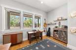 This charming home office features a vintage typewriter on a wooden desk, perfect for creative work.