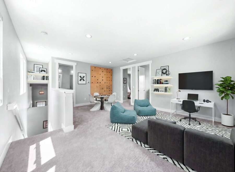 This versatile bonus room offers a perfect blend of entertainment and relaxation.