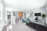 This versatile bonus room offers a perfect blend of entertainment and relaxation.