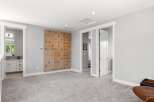 This spacious room features a unique climbing wall, perfect for active individuals or families.