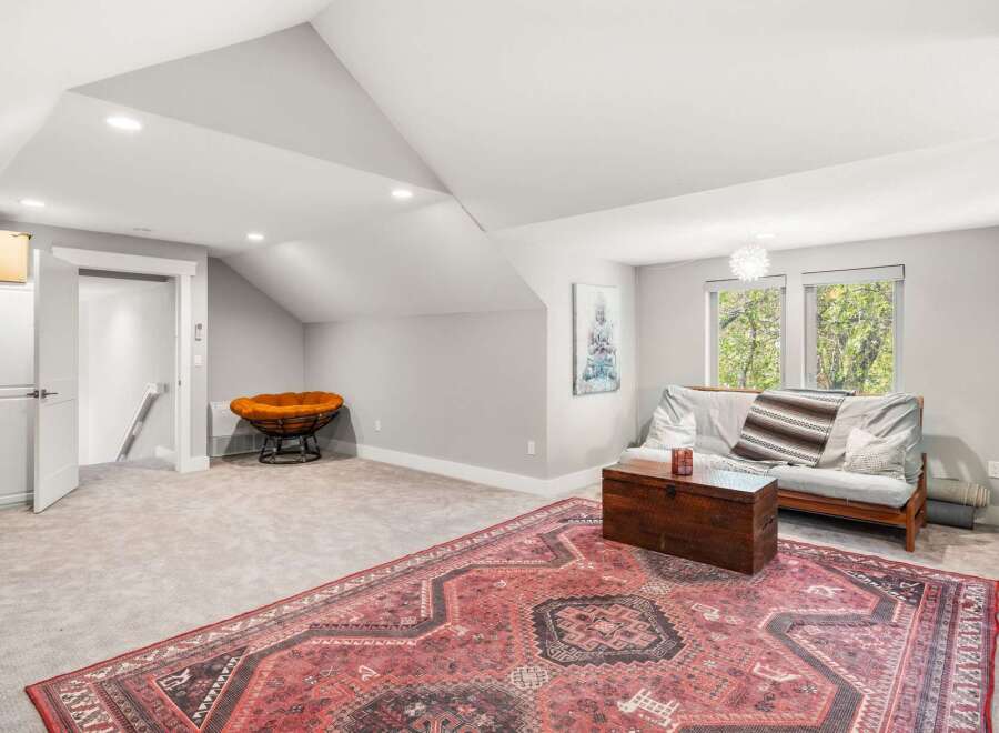 Discover this versatile living space, perfect for relaxation and entertainment.