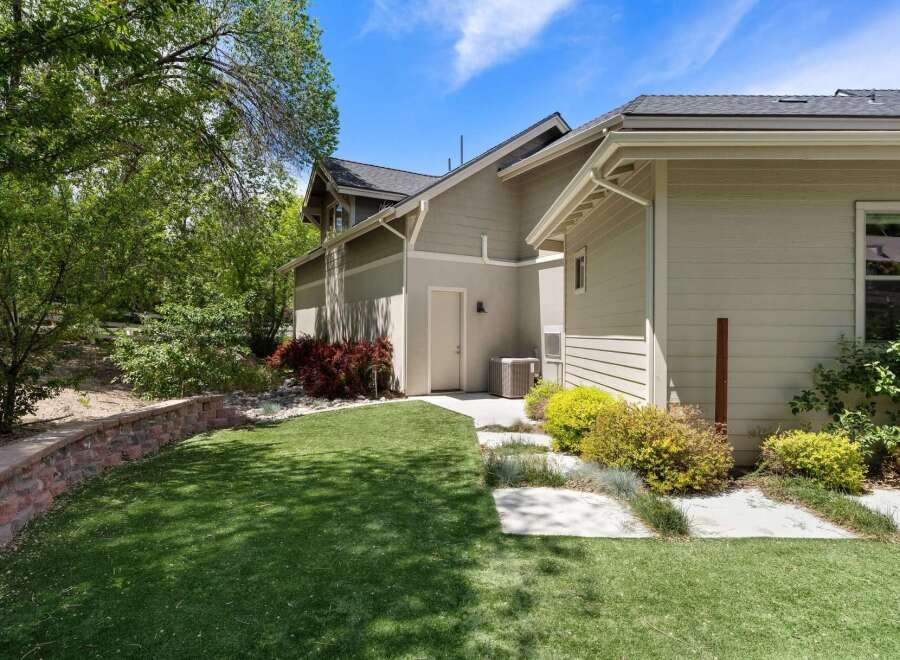 Discover this charming home featuring a beautifully landscaped yard with artificial turf for low maintenance.