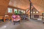 Discover this charming attic loft space, perfect for a cozy reading nook or home office.