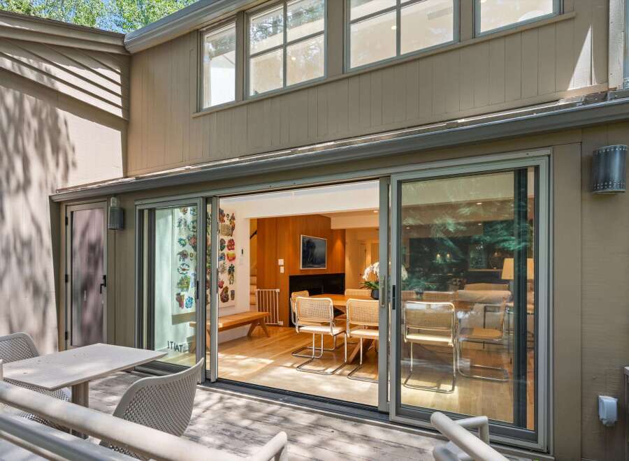 Step outside to a charming deck area, perfect for enjoying the outdoors.