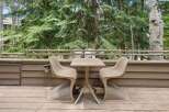 Enjoy your morning coffee or evening drinks on this charming balcony, complete with a stylish table and two chairs.