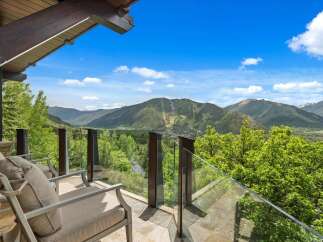 Experience breathtaking mountain views from this stunning balcony, perfect for enjoying your morning coffee or evening relaxation.
