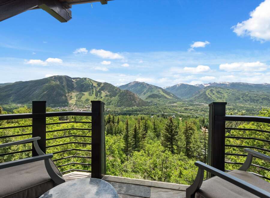 Experience breathtaking mountain views from this stunning property's balcony, perfect for enjoying your morning coffee or evening relaxation.
