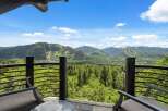 Experience breathtaking mountain views from this stunning property's balcony, perfect for enjoying your morning coffee or evening relaxation.