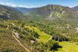 Experience breathtaking mountain views and serene natural beauty from this stunning property, nestled amidst lush greenery and rolling hills.