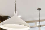 Illuminate your kitchen with these stylish pendant lights, featuring a modern farmhouse design.