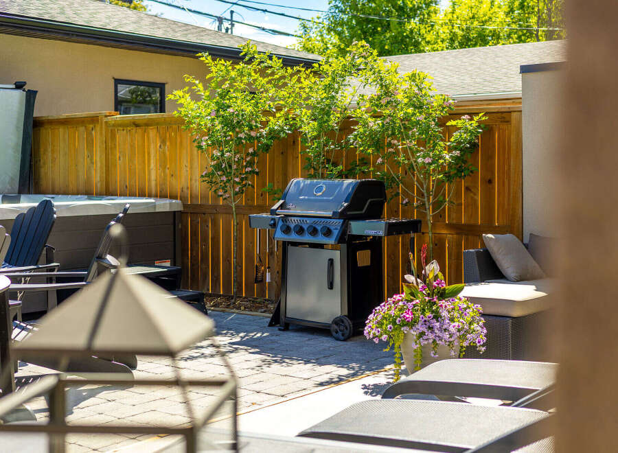 Enjoy outdoor living at its finest with this beautifully appointed backyard oasis.
