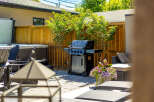 Enjoy outdoor living at its finest with this beautifully appointed backyard oasis.
